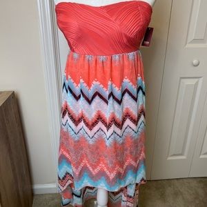 No Boundaries Peach Criss Cross Strapless Dress with Flowly Skirt